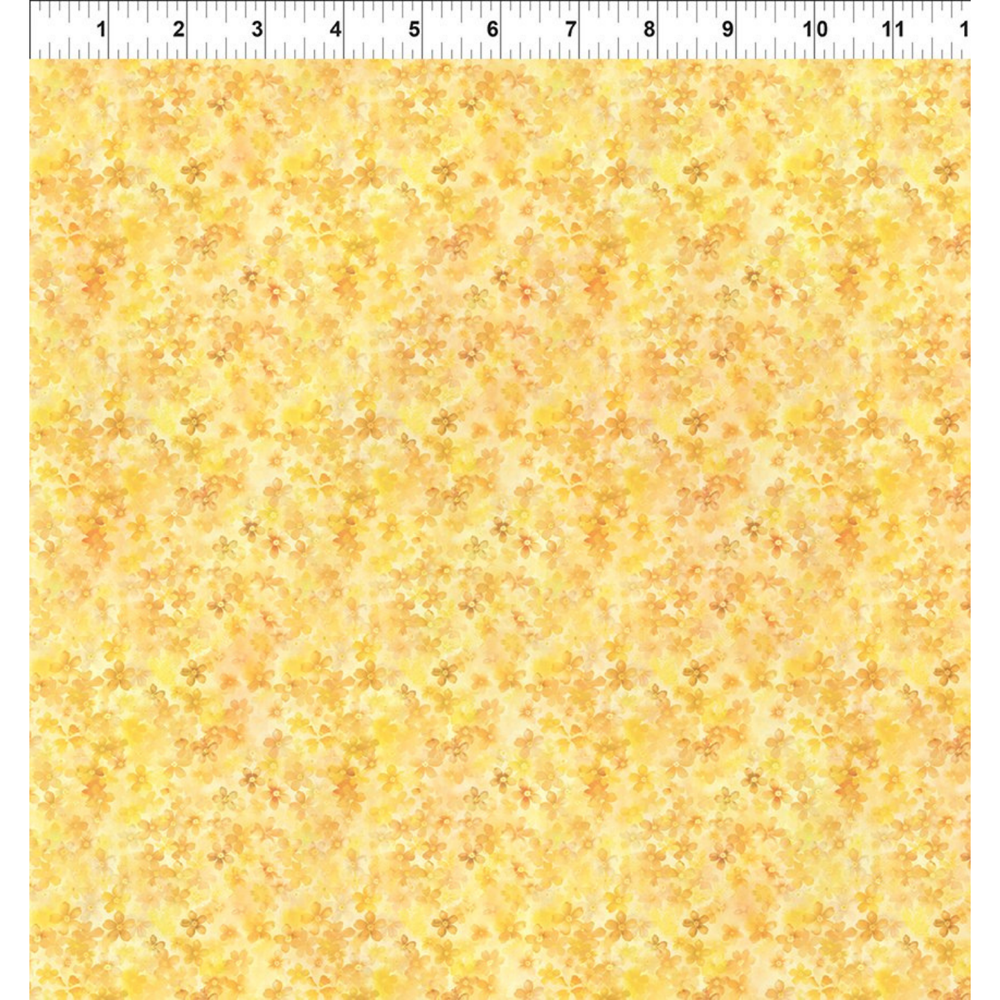 Yellow floral patterned fabric with a ruler for scale