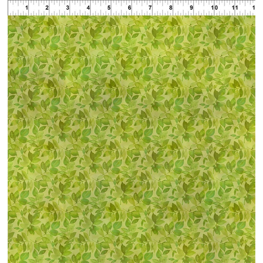 Green leaf pattern fabric with a ruler at the top for scale
