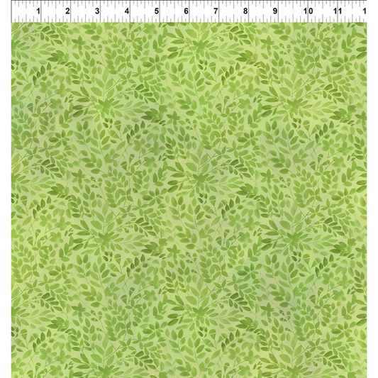 Green leaf pattern on a green background with a ruler for scale