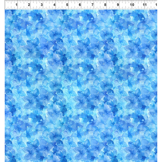 Blue floral pattern on a blue background with a ruler for scale