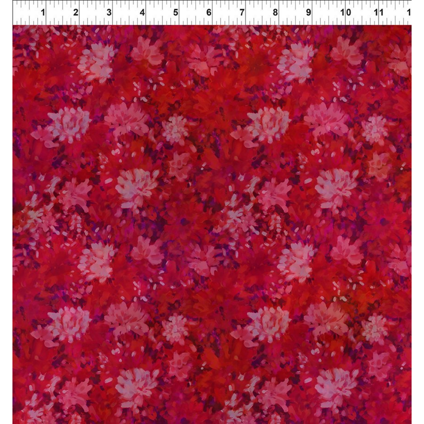 Floral pattern on a red background with a ruler for scale