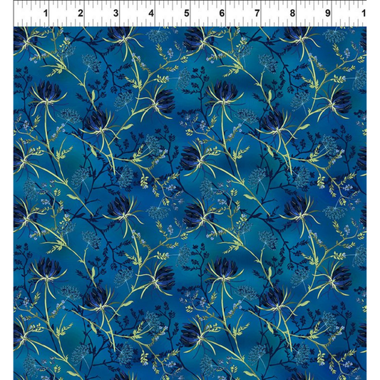 Floral pattern with dark blue flowers and green stems on a blue background with a ruler for scale