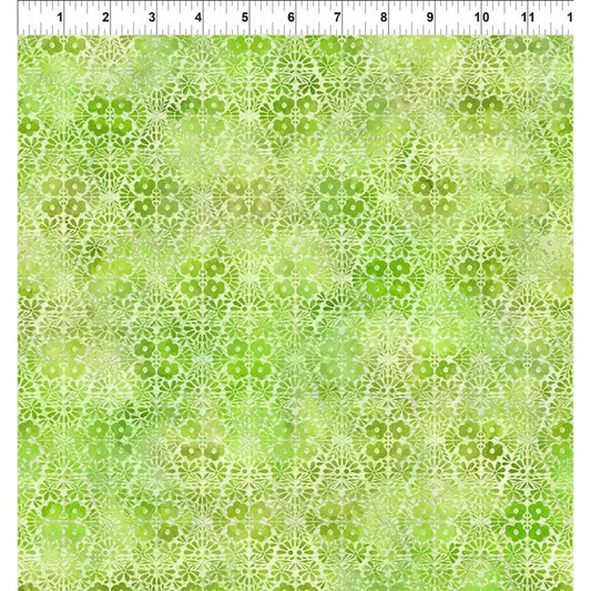 A fabric swatch featuring graceful geometric diamonds of tiny flower clusters and leafy sprigs in vibrant lime and lush green with a ruler at the top indicating scale.