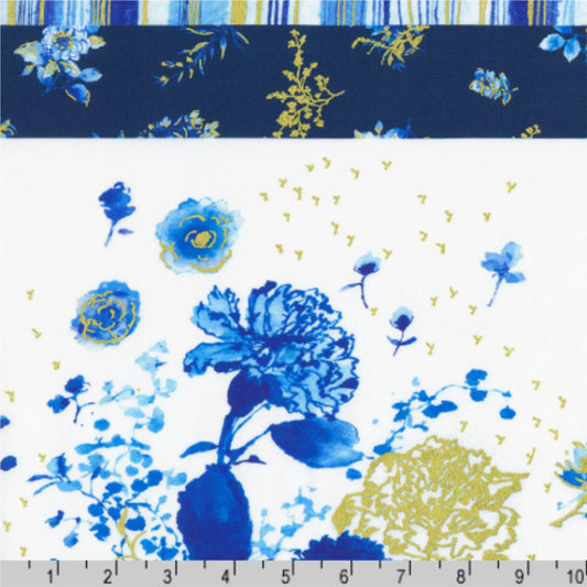 Floral fabric pattern with blue and gold flowers on a white background, with a ruler at the bottom for scale.