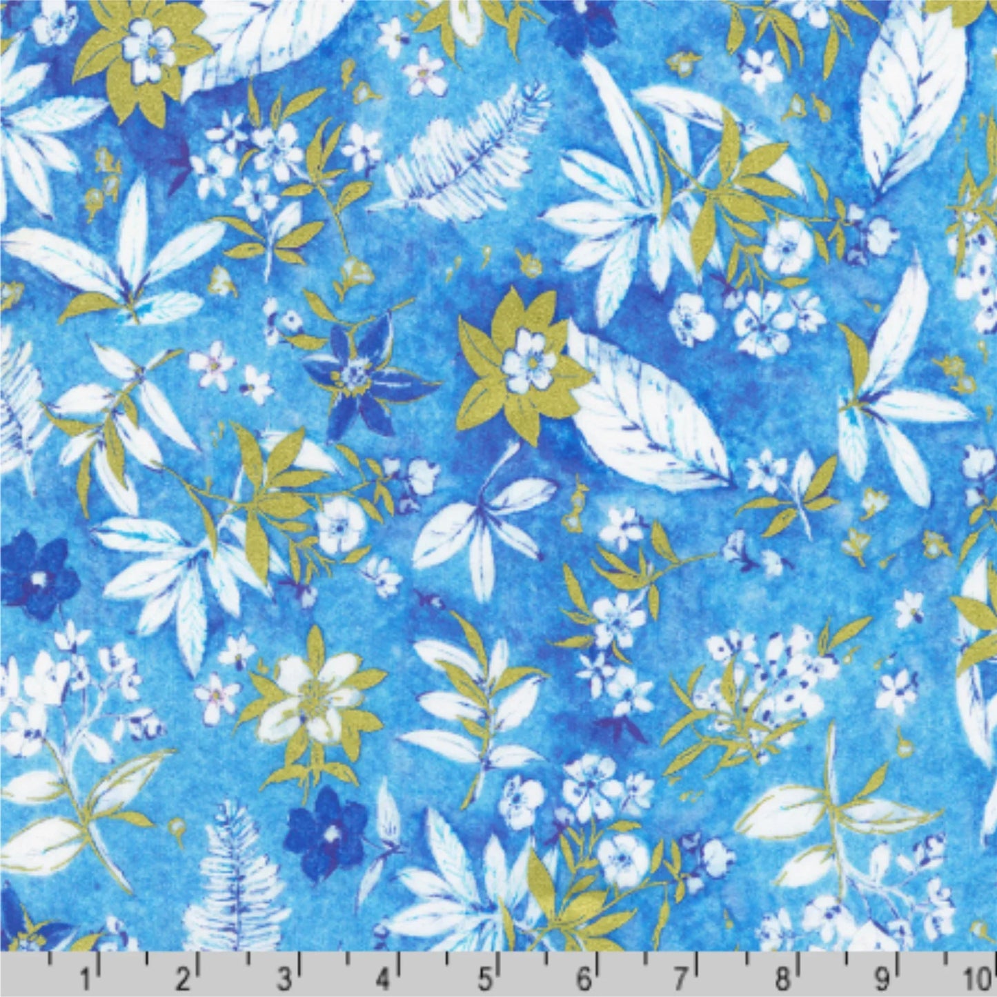 Floral pattern with blue, gold, and white flowers on a blue background with a ruler for scale