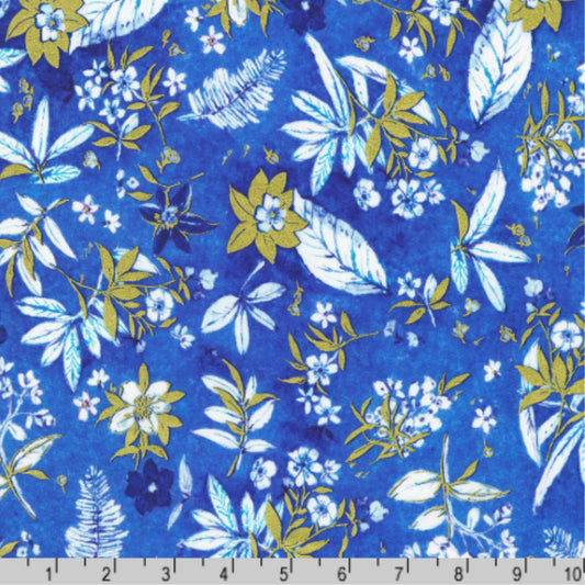 Floral pattern with blue, gold, and white flowers on a blue background with a ruler for scale