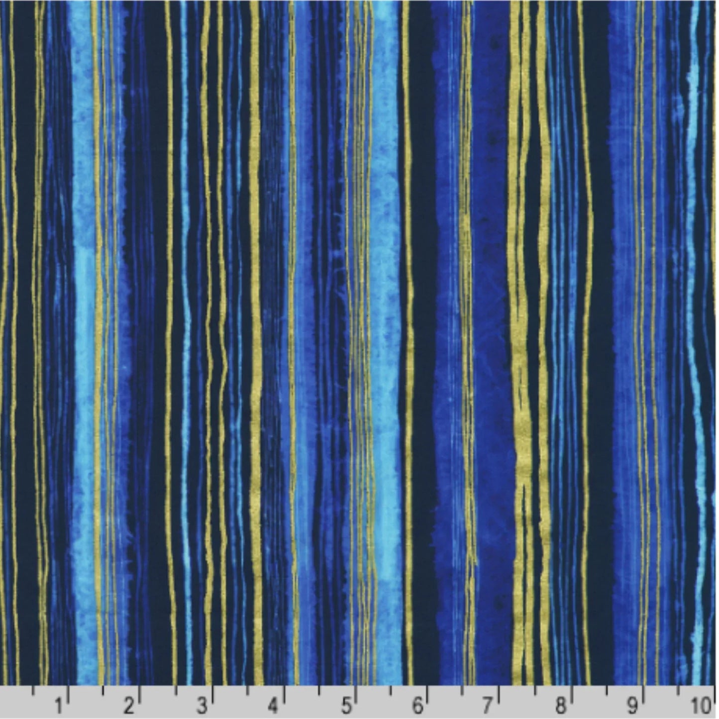 Striped fabric pattern with blue and gold lines with a ruler for scale