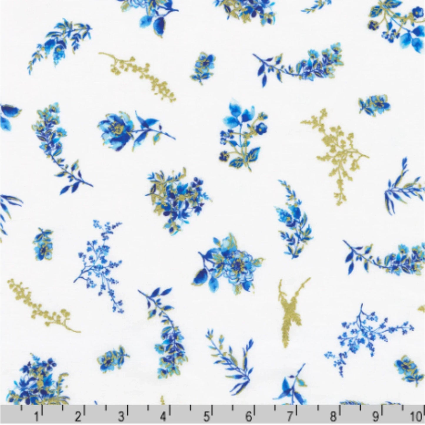 Pattern of blue and gold floral designs on a white background with a ruler for scale