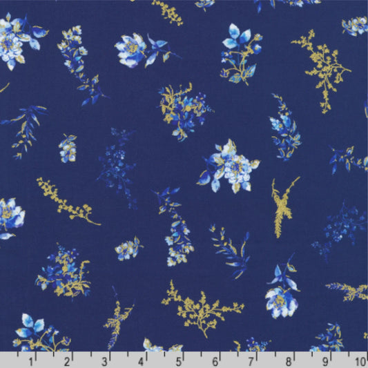 Floral pattern with blue and gold flowers on a dark blue background with a ruler for scale