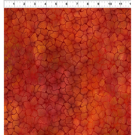 A fabric design with a stained-glass floral pattern in warm orange, red, and burgundy tones, with a white ruler along the top edge for scale.