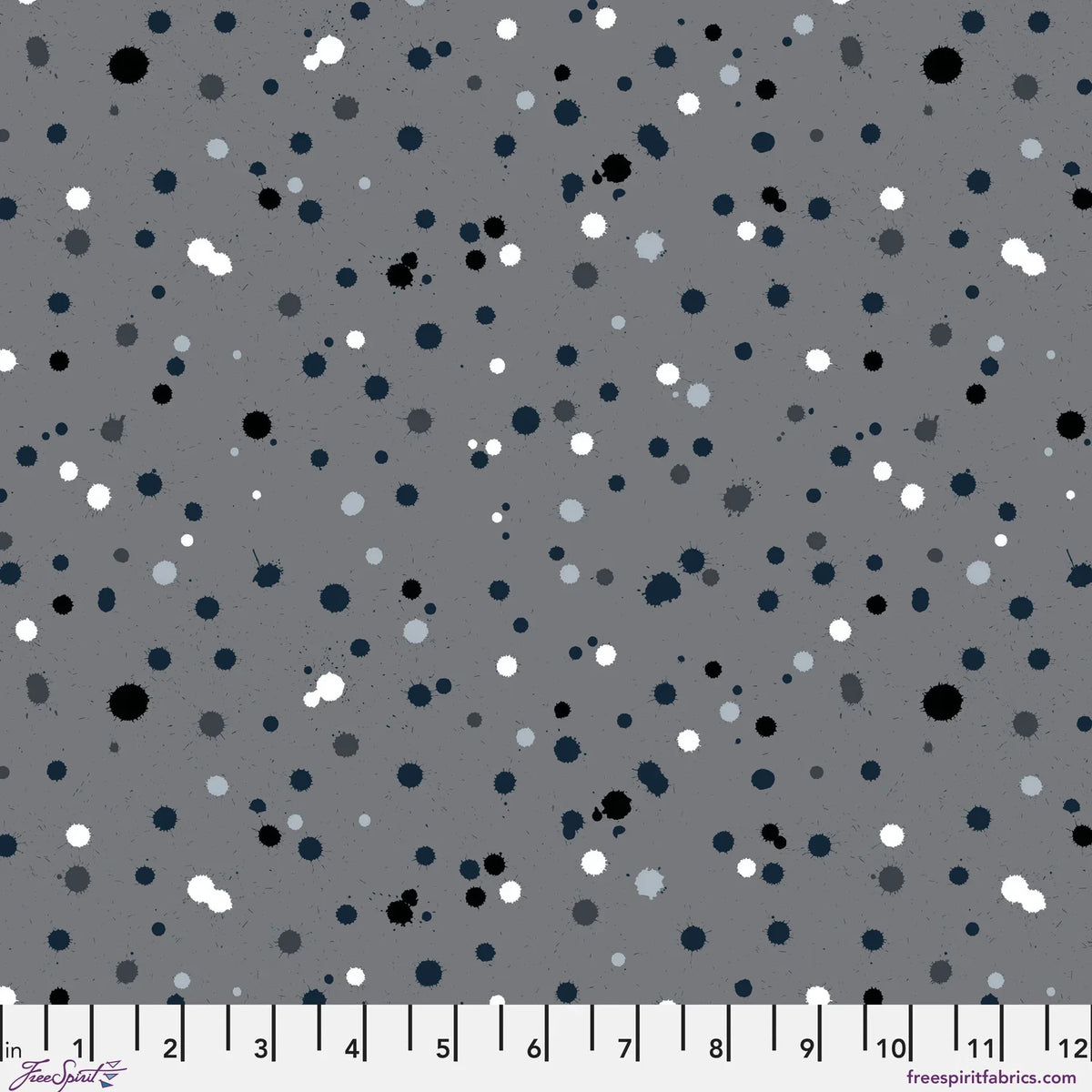 Fabric design with paint drops in black, white, and slate-grey tones scattered across a medium grey background. Ruler at the bottom for scale.