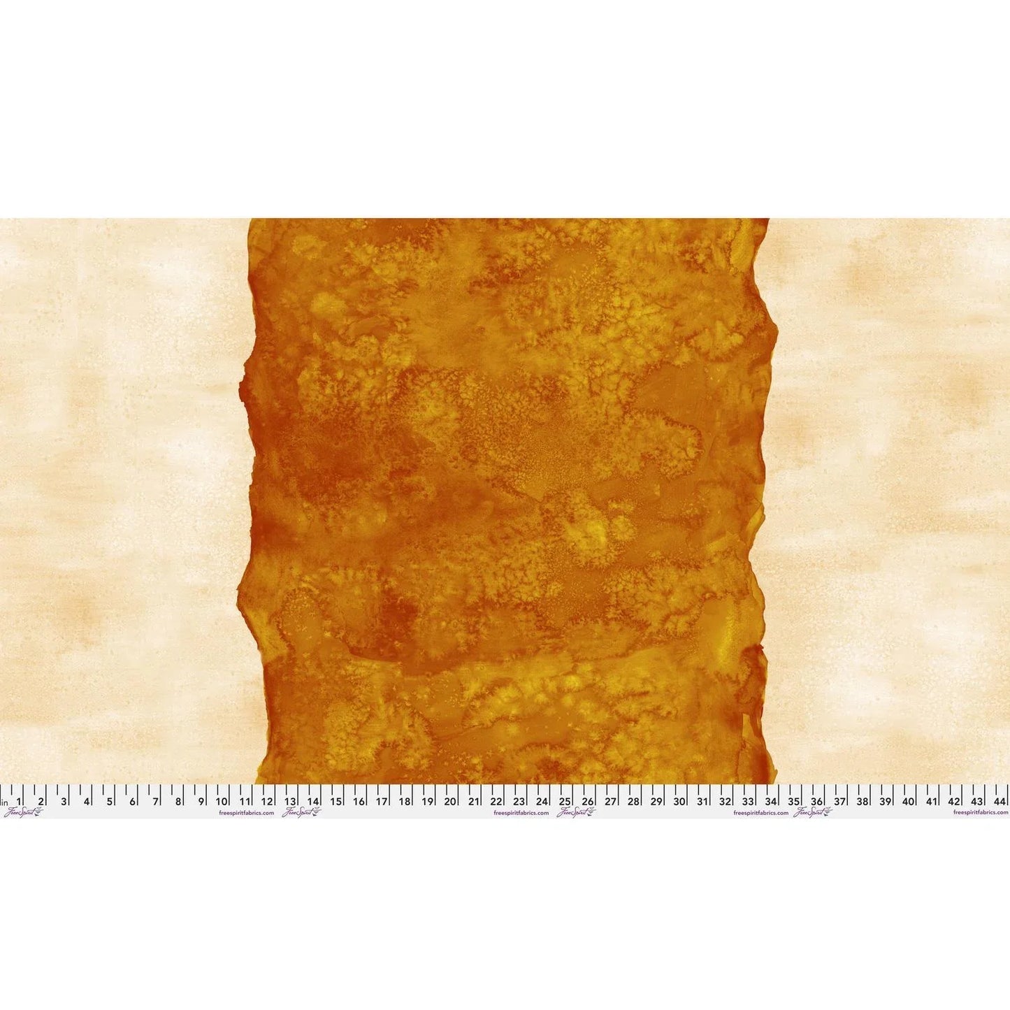Abstract fabric pattern with a watercolor-like texture featuring a central stripe of burnt orange and outer light, peachy cream edges. Ruler at the bottom for scale.