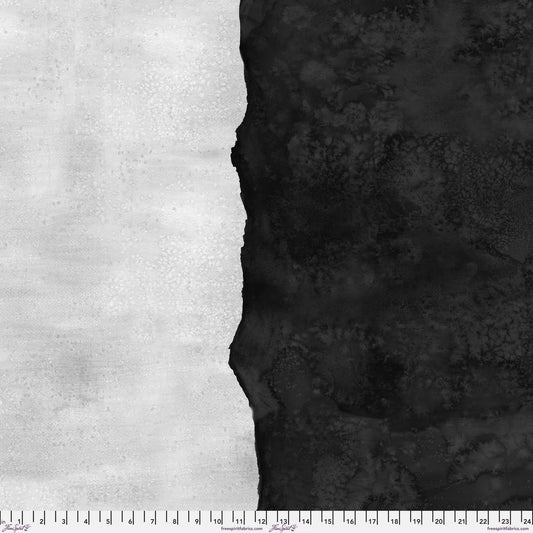Abstract fabric pattern with a watercolor-like texture featuring black and light, stone grey. Ruler at the bottom for scale.