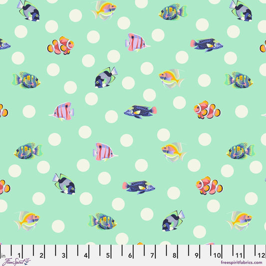 Pattern of colorful fish on a light blue background with white polka dots and a ruler at the bottom for scale.