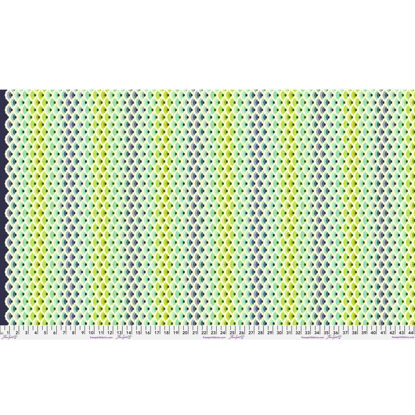 Geometric pattern of overlapping scalloped shapes with green, blue, navy, and turquoise colors on a dark background. Ruler at the bottom for scale.
