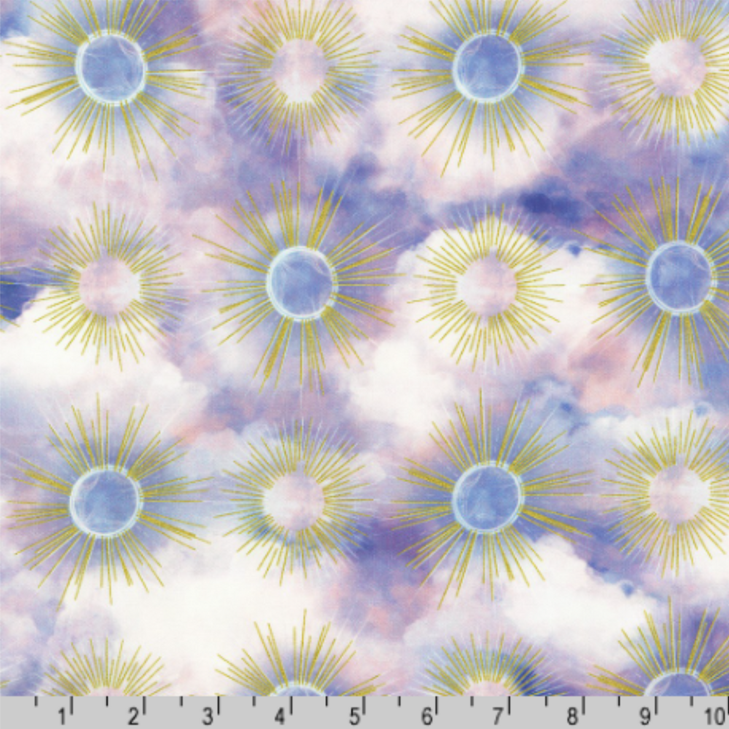Pattern of sunburst designs with golden rays on a cloudy pastel purple background with a ruler for scale.