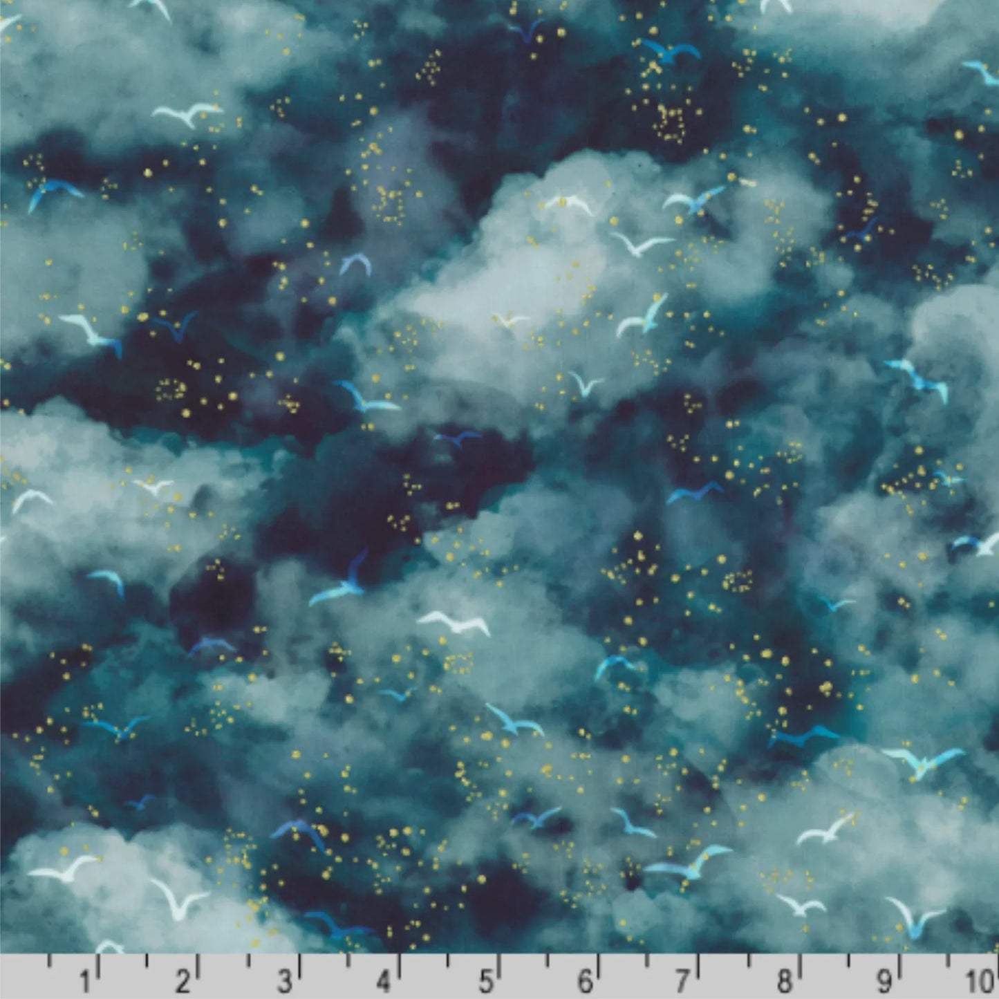 A rich, dramatic cloud print blending deep teal, navy, and shadowy blue hues with scattered birds and glowing gold-style speckles. Ruler for scale.