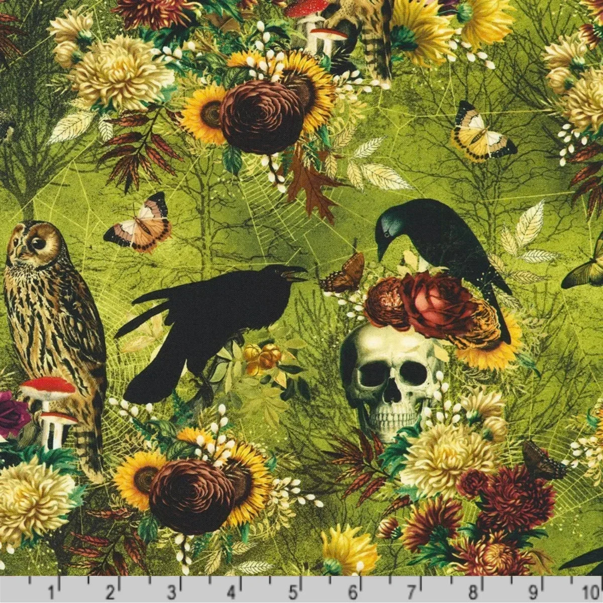 Macabre nature-themed fabric with crows, owls, flowers, skulls, moths, and spider webs on a lime-green background with a ruler for scale.