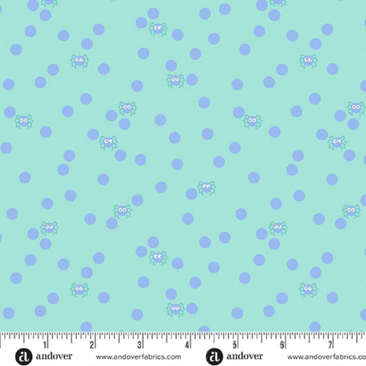 Pattern of small periwinkle dots and cartoon spiders on a light aqua background with a ruler for scale.