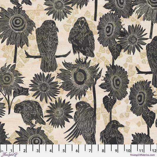 Pattern of black crows and sunflowers on a soft beige background with a ruler for scale