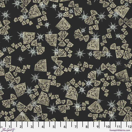 Pattern of gold diamonds and stars on a black background with a ruler at the bottom for scale.