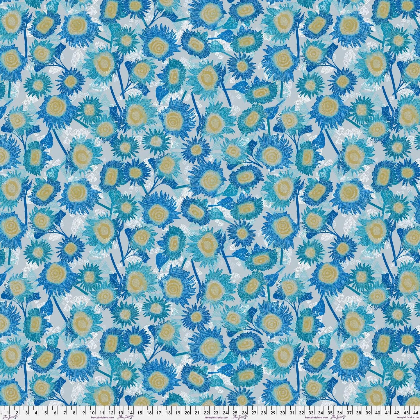Pattern of blue and yellow flowers on a light blue background with a ruler at the bottom for scale.