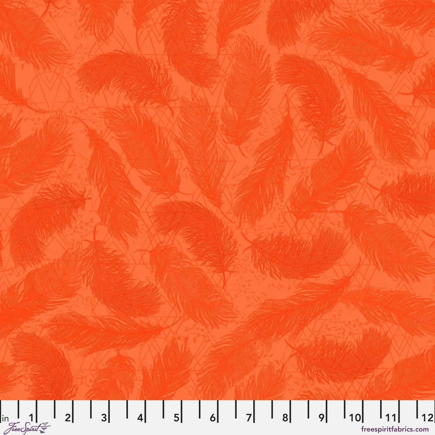 Pattern of red-orange feathers on a textured orange background with a ruler for scale.