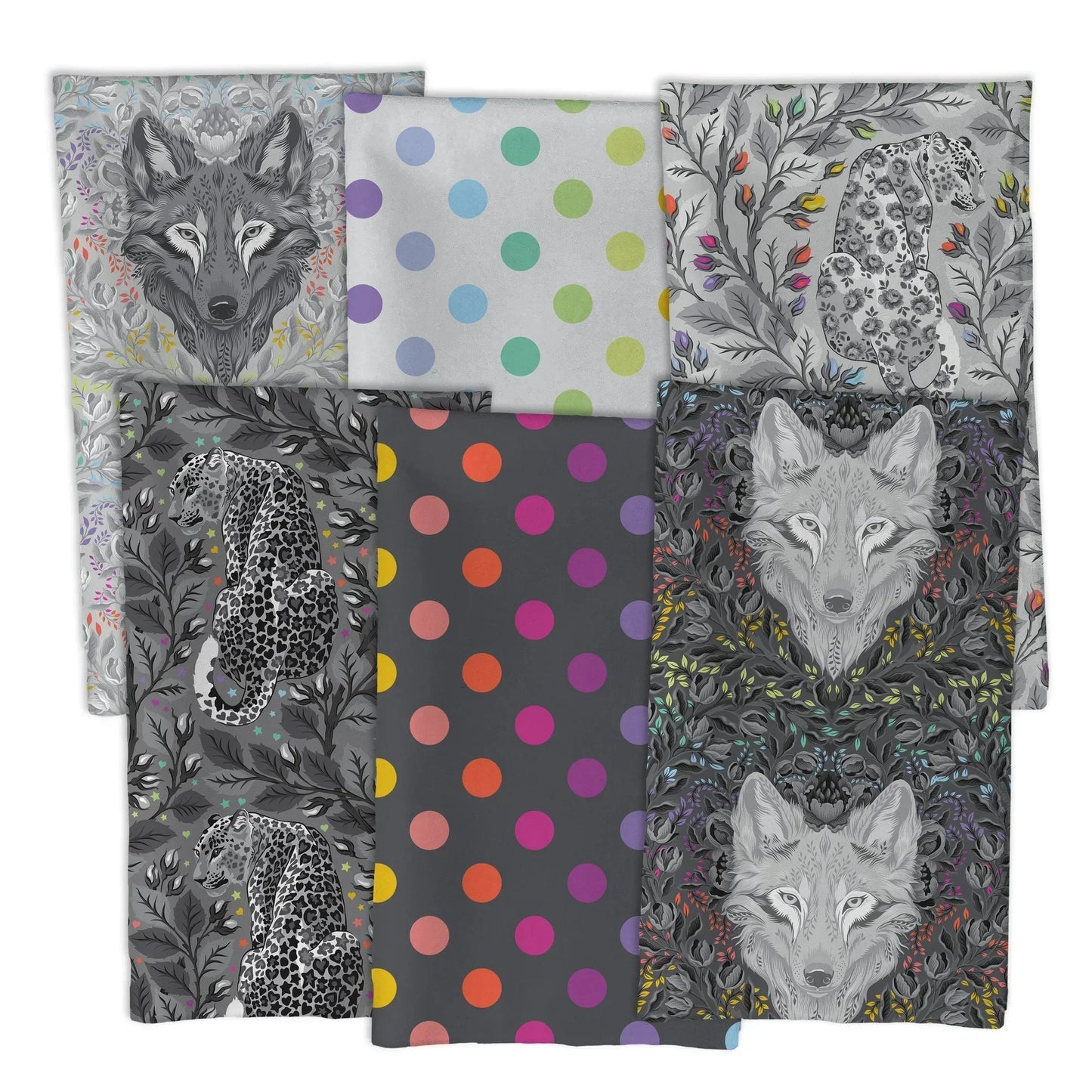 Collection of fabric swatches featuring wolves and polka dots on a white background