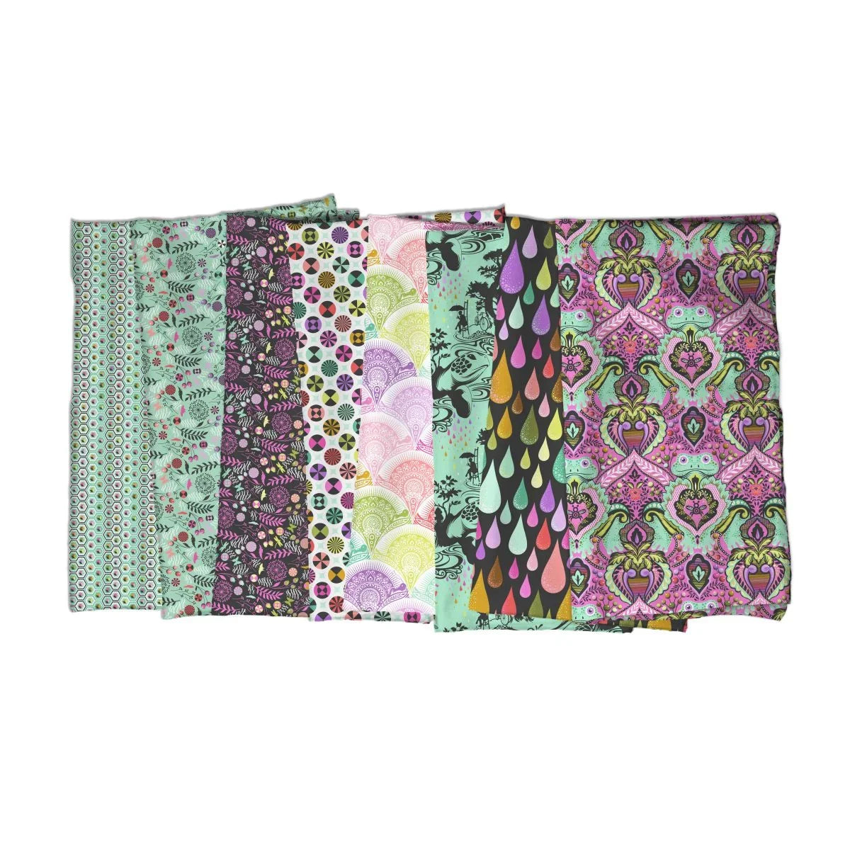 Six folded fabric pieces from the Prince Charming (Deja Vu) collection. They feature colorful patterns, including raindrops, green frogs, florals, and geometric designs, arranged side by side on a white background.