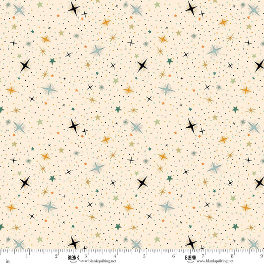 Pattern of colorful stars on a beige background with a ruler at the bottom for scale.