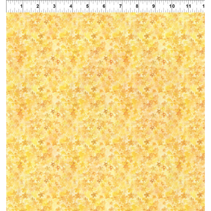 Yellow floral patterned fabric with a ruler for scale