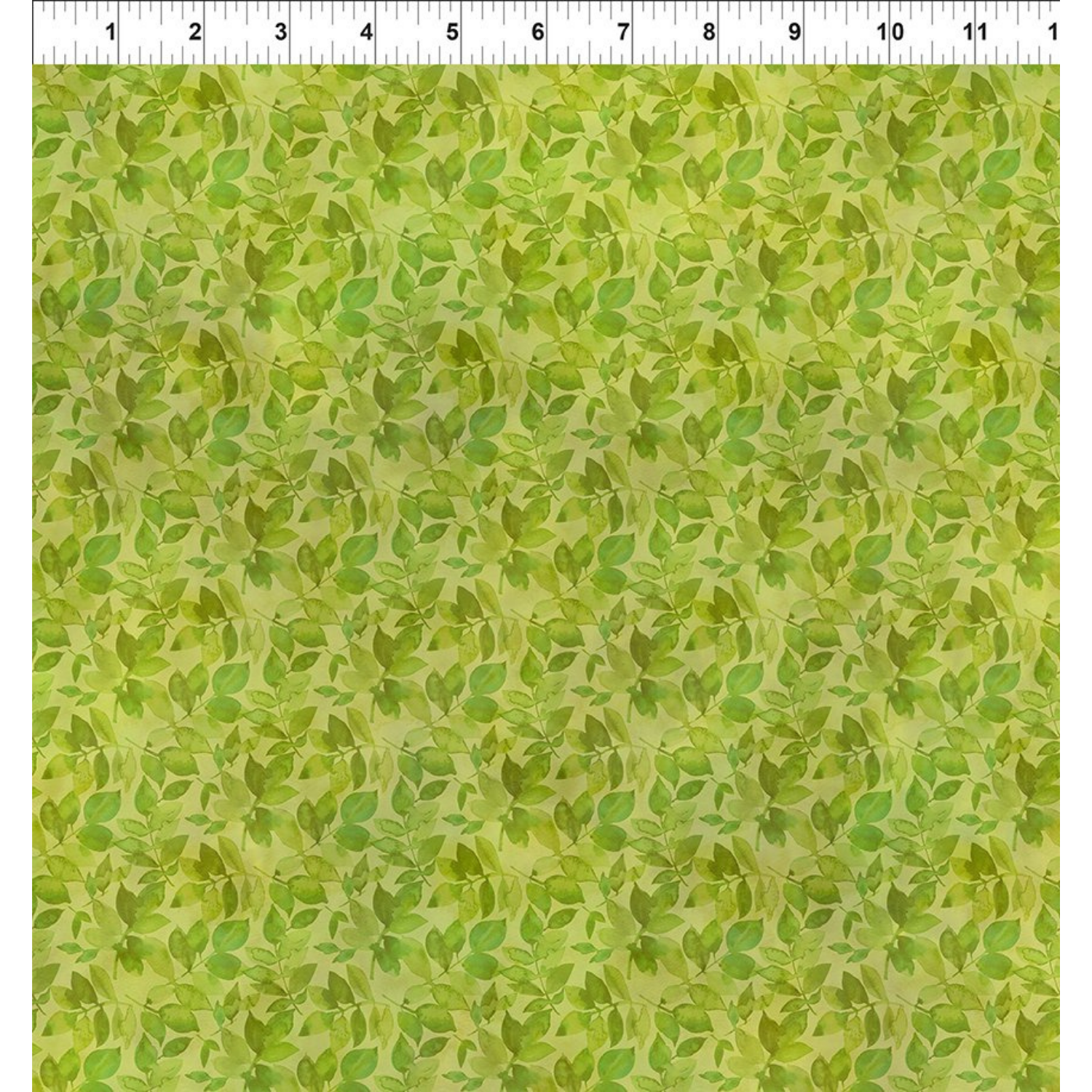 Green leaf pattern fabric with a ruler at the top for scale