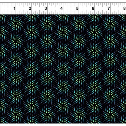 Grid pattern of playful geometric pinwheels comprised of tiny blue and green dots on a black background. Ruler for scale.