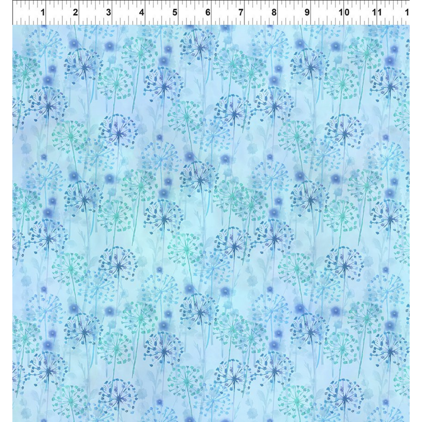 Pattern of blue and turquoise dandelions on a light blue background with a ruler for scale
