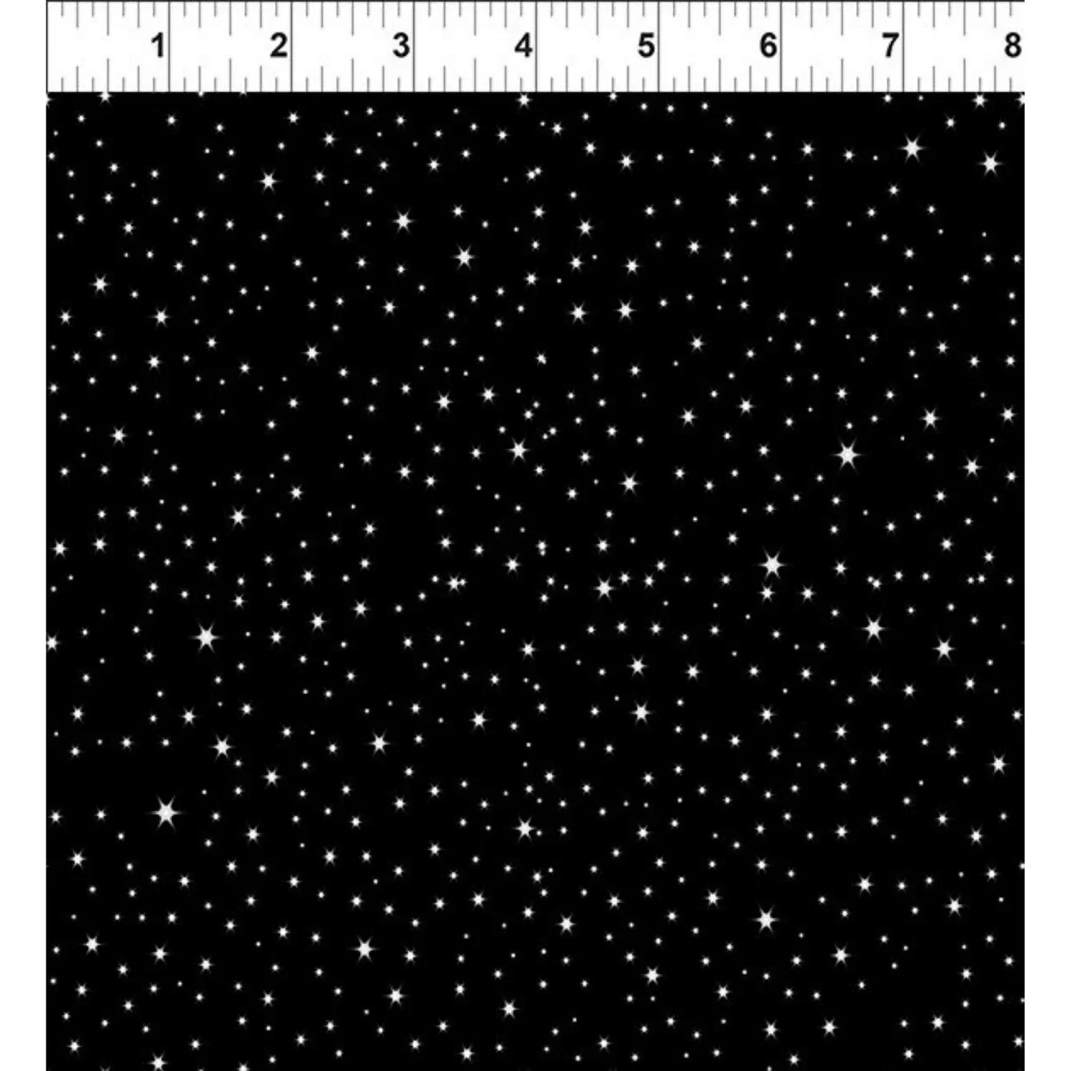 Black fabric with scattered white stars and a ruler at the top for scale.