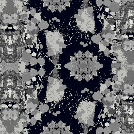 Abstract pattern with skulls and paint splatters on a black background