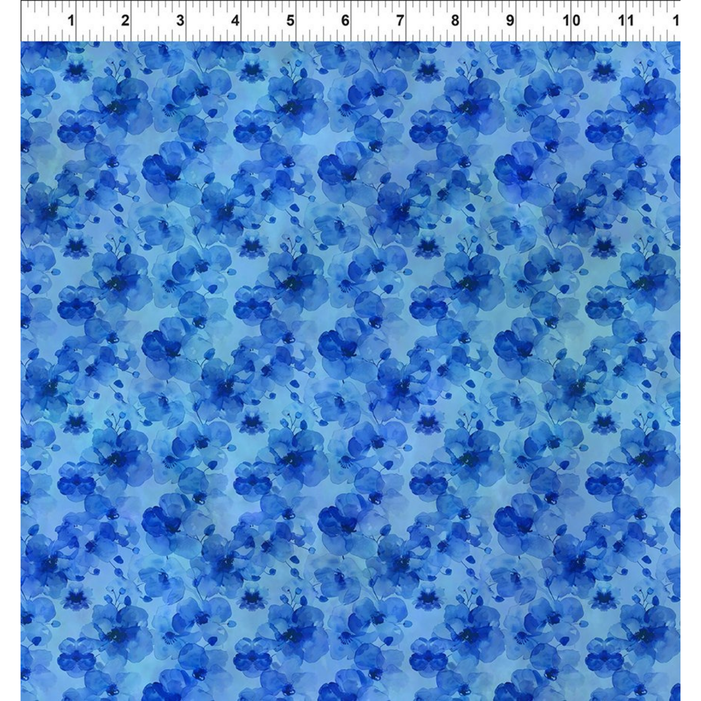 Pattern of blue flowers on a blue background with a ruler for scale