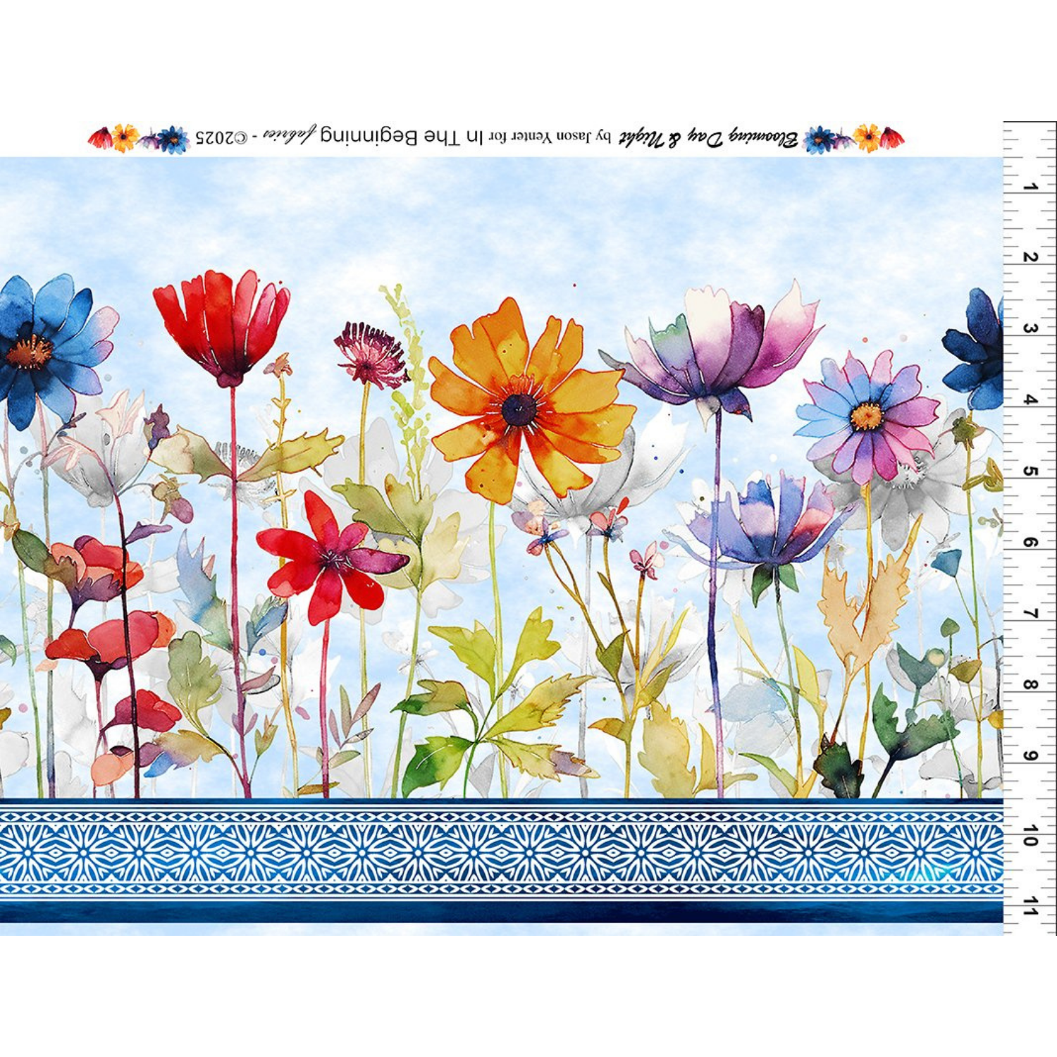 Colorful floral design on a blue background with a ruler at the bottom for scale 