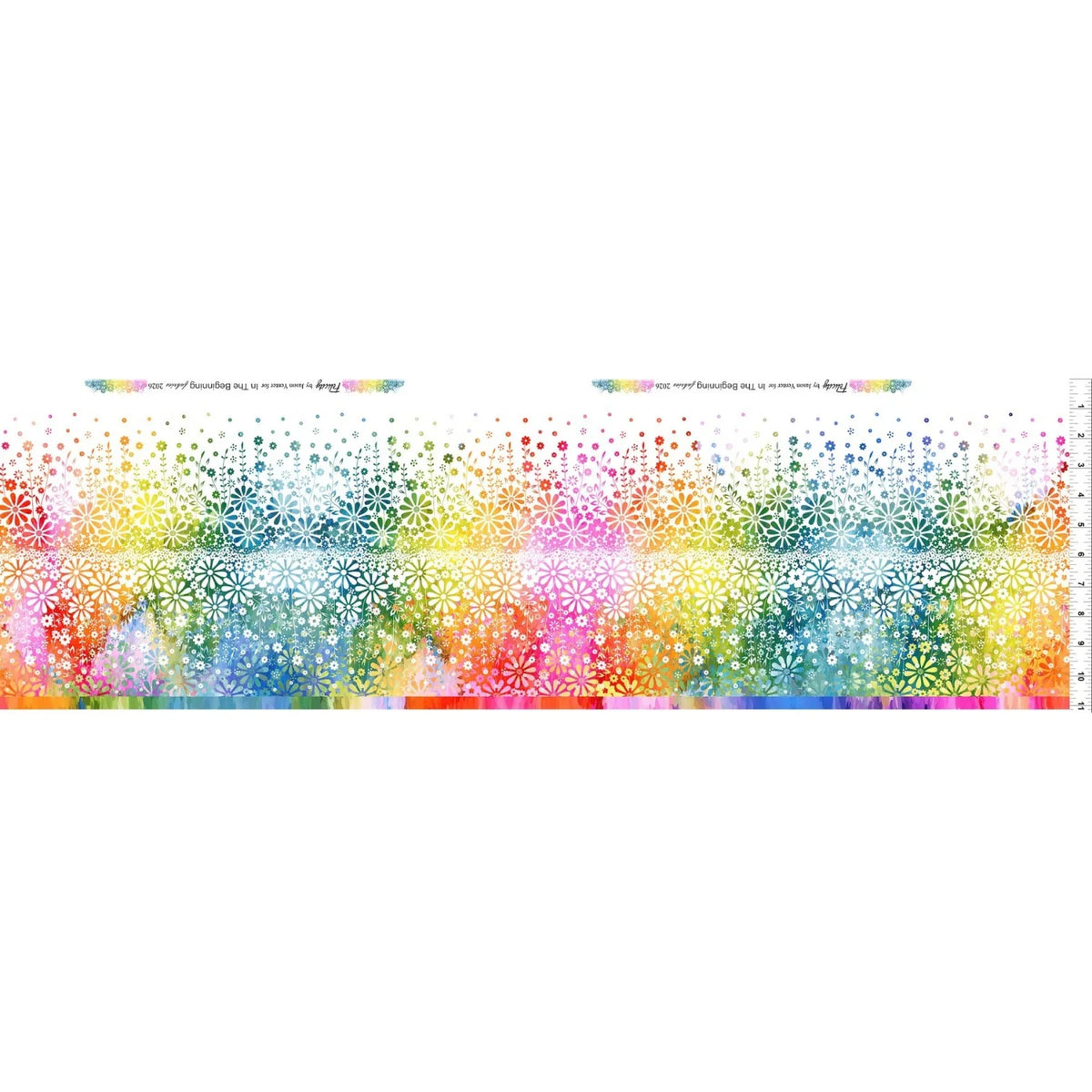 Quilting fabric with a wide floral stripe in a colorful rainbow gradient, shown against a plain white background. Ruler on the side for scale.