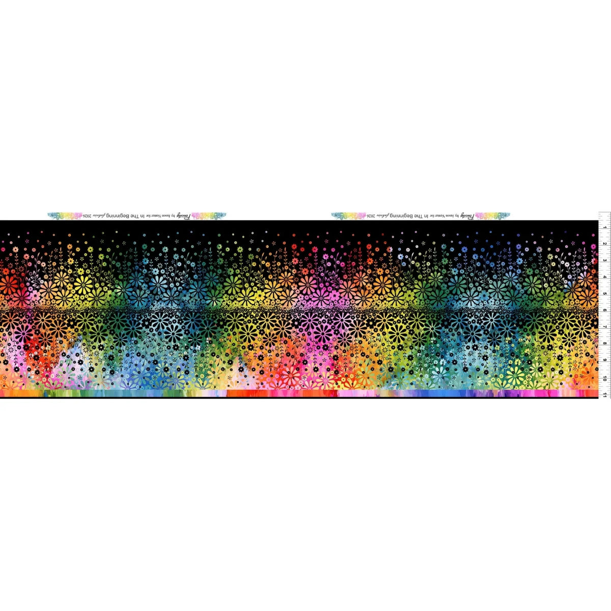 Fabric featuring a horizontal stripe of wildflowers shifting in a rainbow gradient against a deep black background. Ruler along the right side for scale.