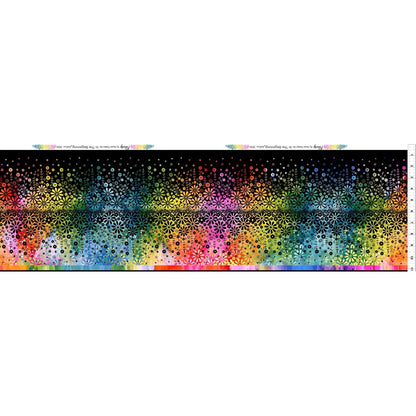 Fabric featuring a horizontal stripe of wildflowers shifting in a rainbow gradient against a deep black background. Ruler along the right side for scale.