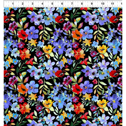 Colorful floral pattern on a black background with a ruler for scale