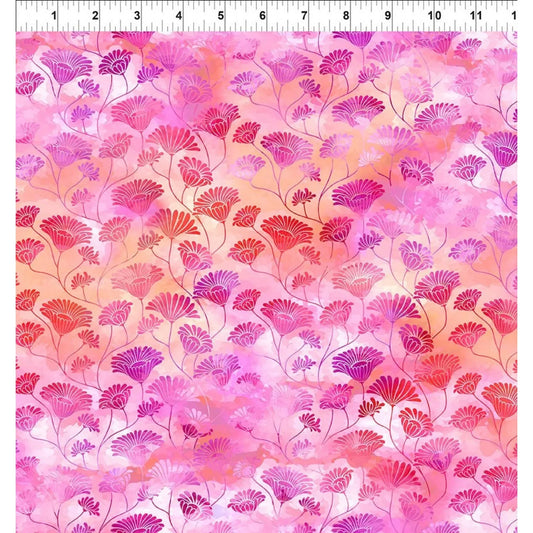 A fabric swatch featuring a repeating design of stylized pink, magenta, and red fan-shaped flowers on a watercolor-like pink and peach background, with a white ruler at the top indicating scale.