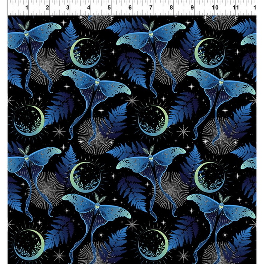 Pattern of blue lunar moths and green moons on a black background with a ruler for scale