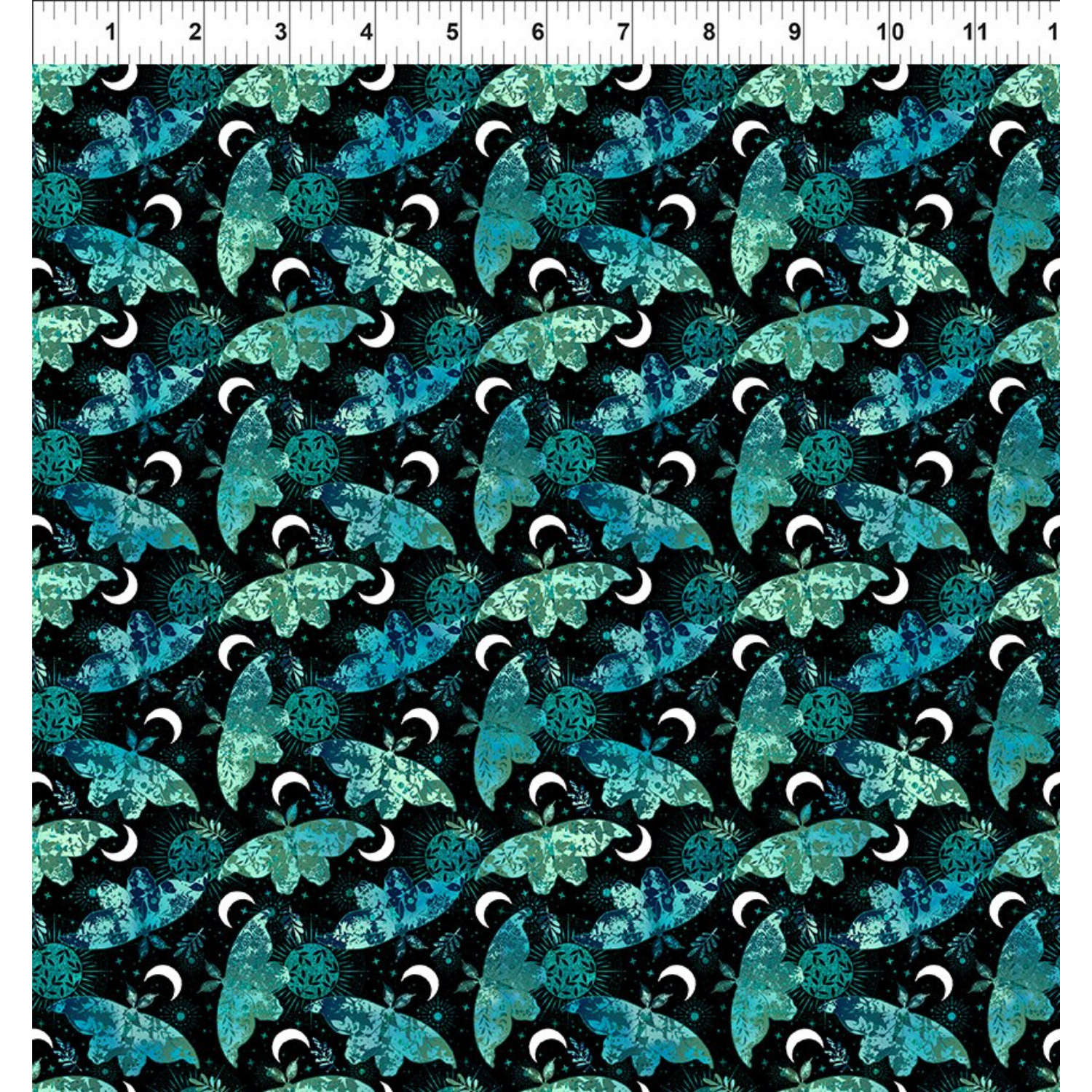 Pattern of blue and green moths on a black background with a ruler for scale.