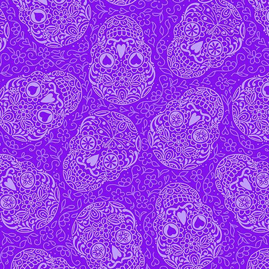 Day of the Dead Sugar Skulls in Grape features intricately detailed lavender sugar skulls tossed across a purple background.