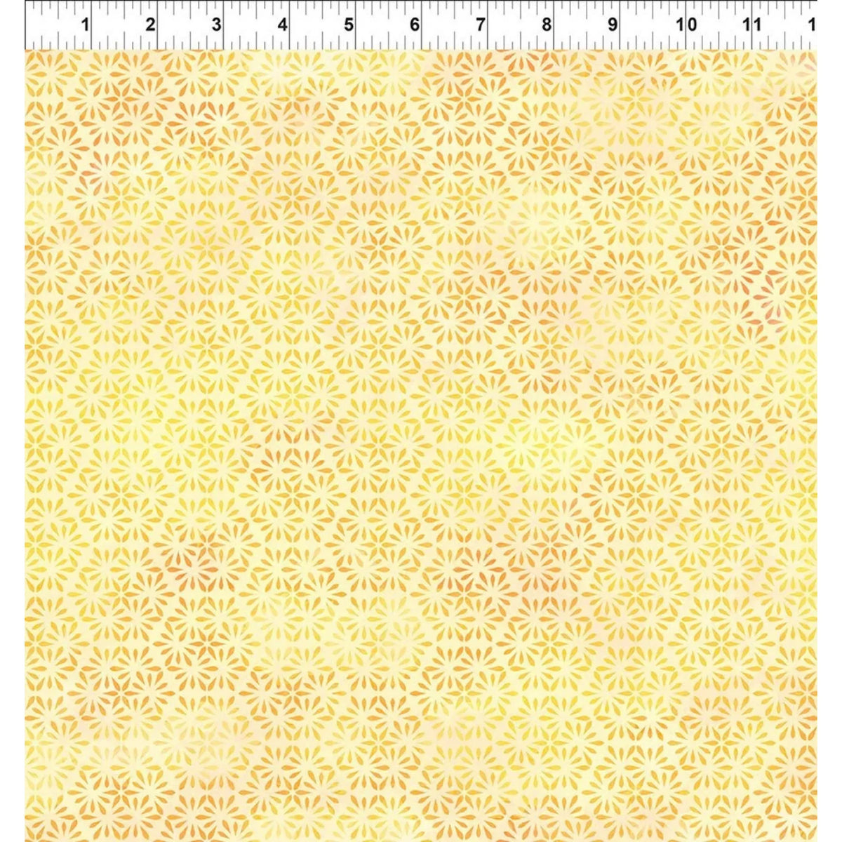 A fabric swatch with a repeating pale yellow and cream floral hexagon pattern, with a ruler at the top for scale.
