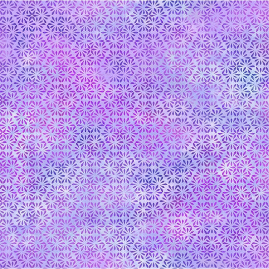 A fabric swatch featuring a repeating hexagonal pattern of tiny daisy-like petals in violet, periwinkle, and soft fuchsia.
