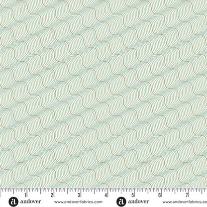 A repeating pattern of wavy diagonal lines in muted sage green and tan on a very light off-white background. Ruler at the bottom for scale.