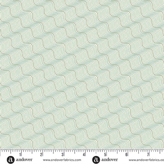 A repeating pattern of wavy diagonal lines in muted sage green and tan on a very light off-white background. Ruler at the bottom for scale.